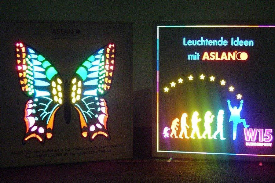 blockoutfolie mit hinterleuchtetem schmetterling aus transparenten farbfolien